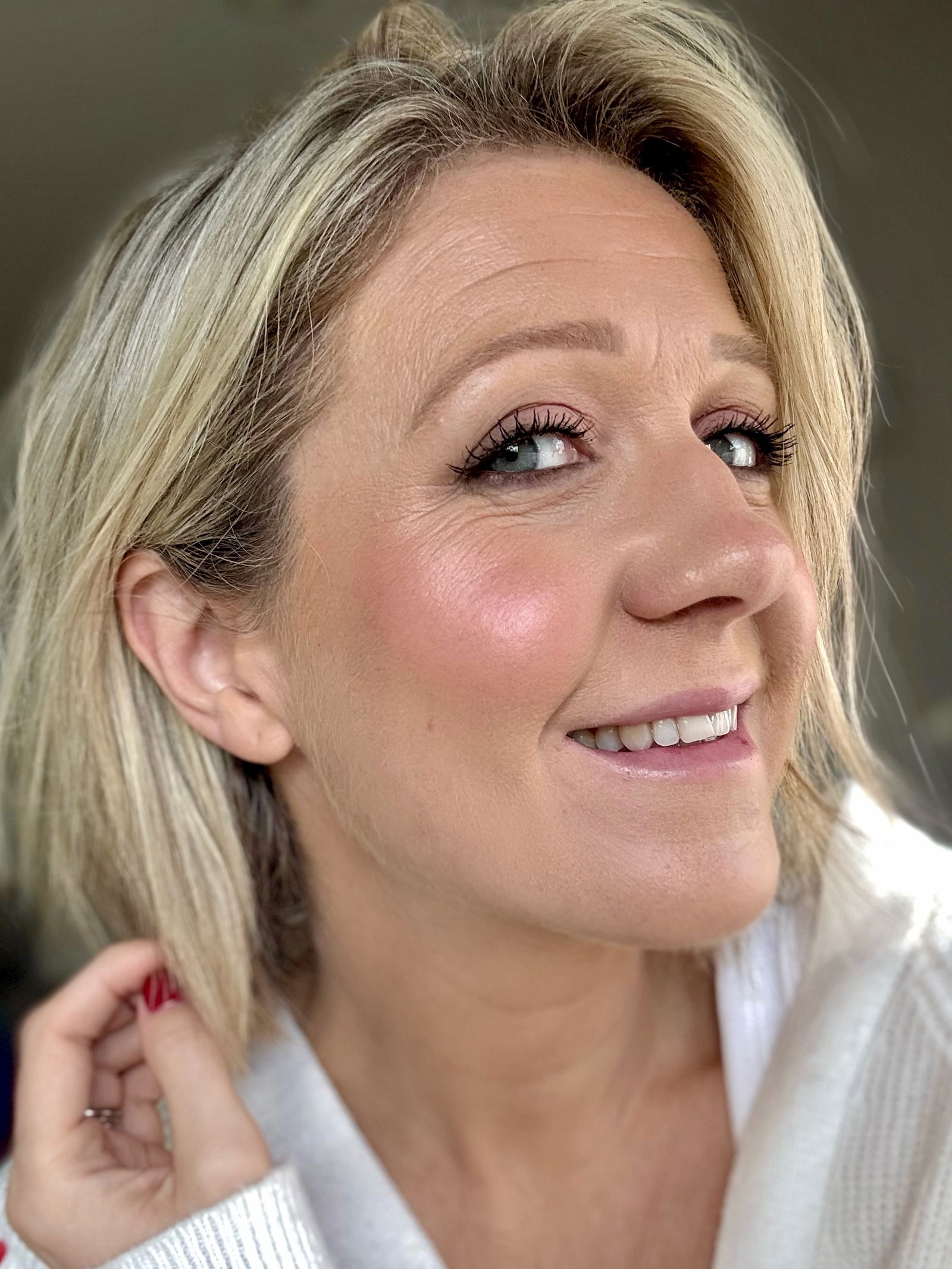 Glow Recipe's Watermelon Glow Niacinamide Dewy Flush Tinted Serum in Dragon Fruit on face