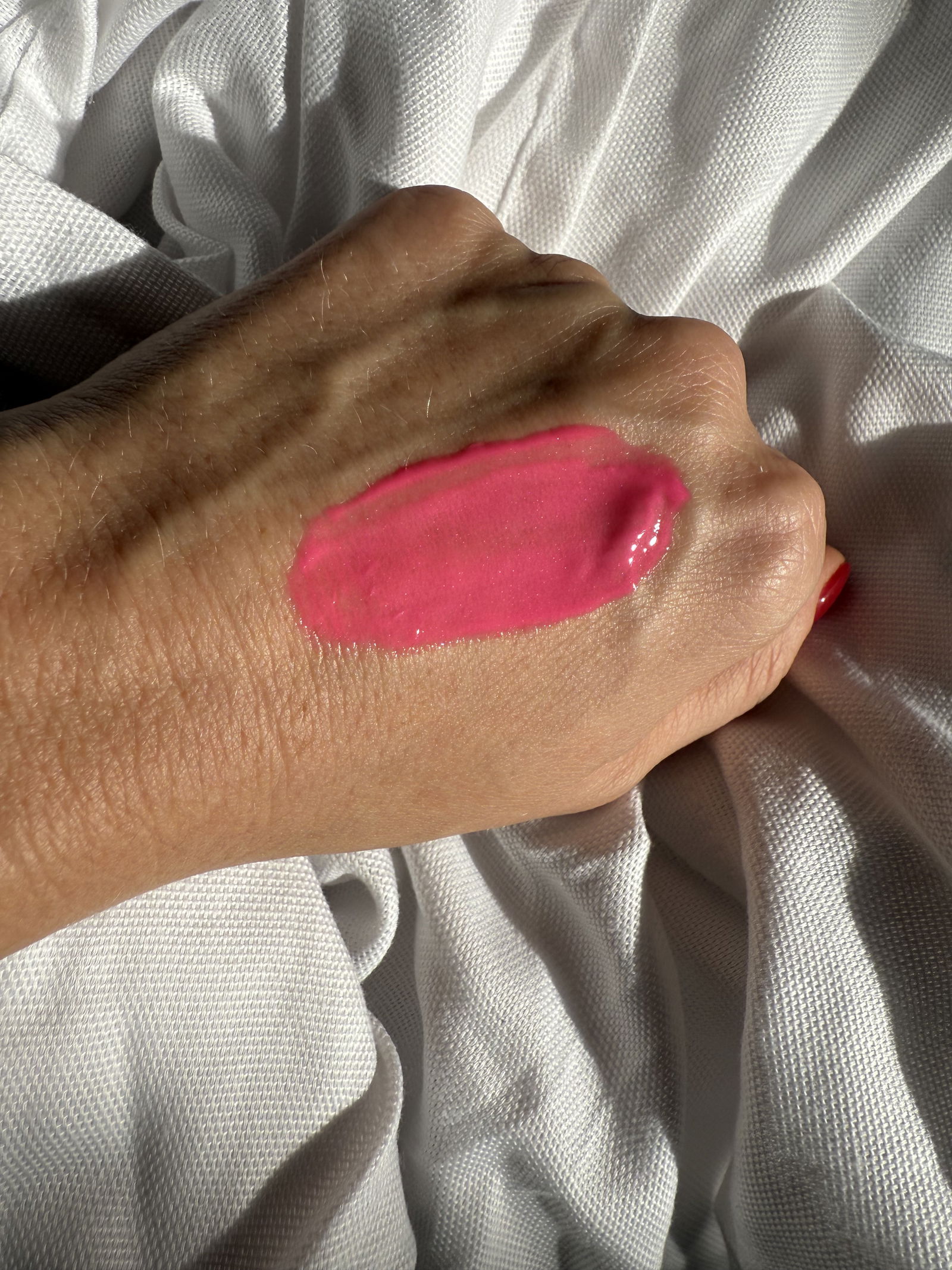 Glow Recipe's Watermelon Glow Niacinamide Dewy Flush Tinted Serum in Dragon Fruit swatch