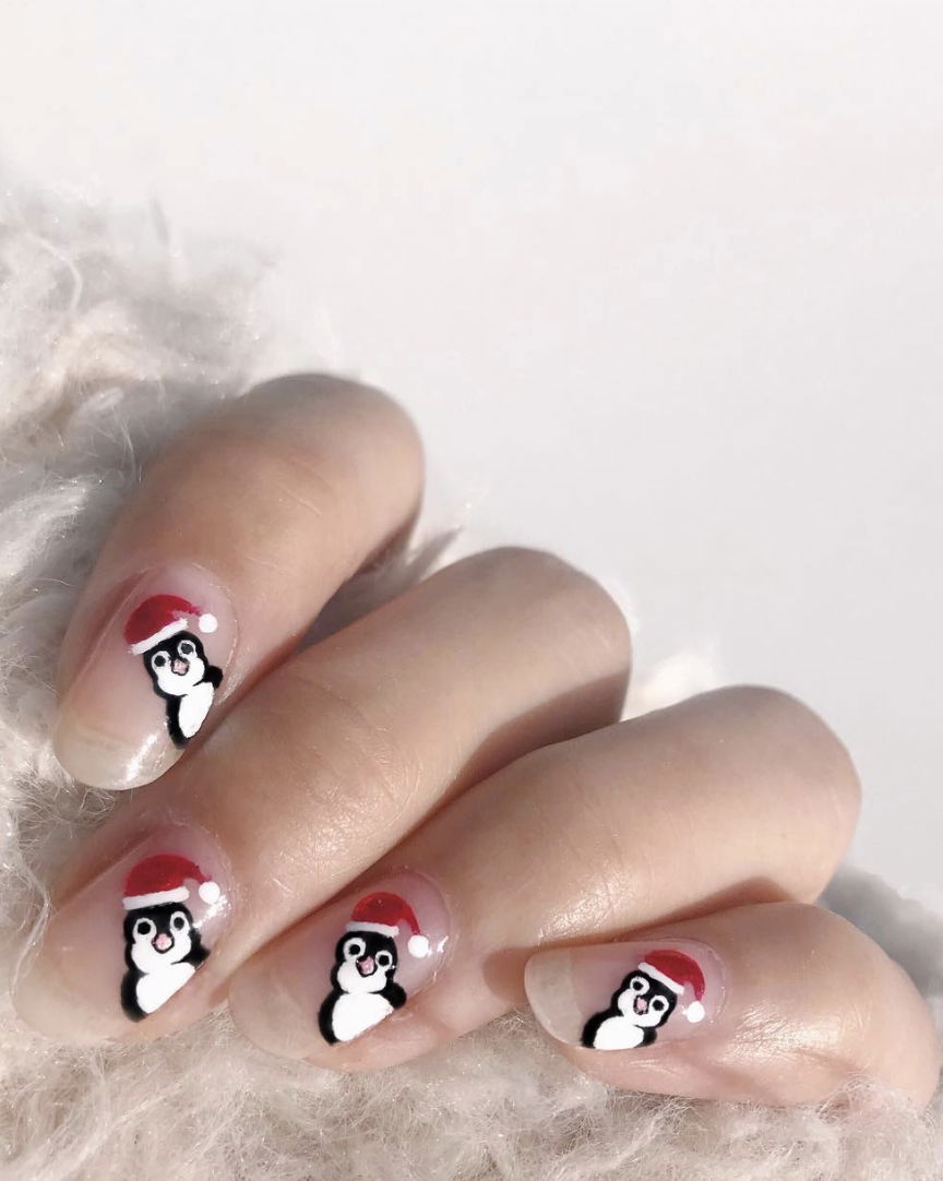 Cute festive penguin nails