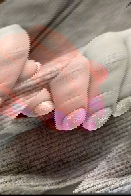Pink snowflake Christmas nails