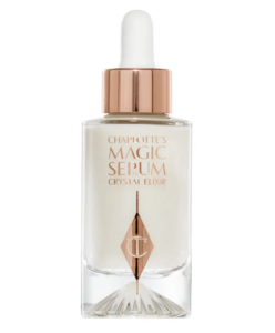 Charlotte's Magic Serum Crystal Elixir bottle with a white dropper cap and rose-gold collar on white background (informative product image).