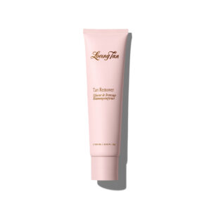 Pink tube labeled 'LounTan' with 'Tan Remover' text, standing against a white background with a shadow to the right.