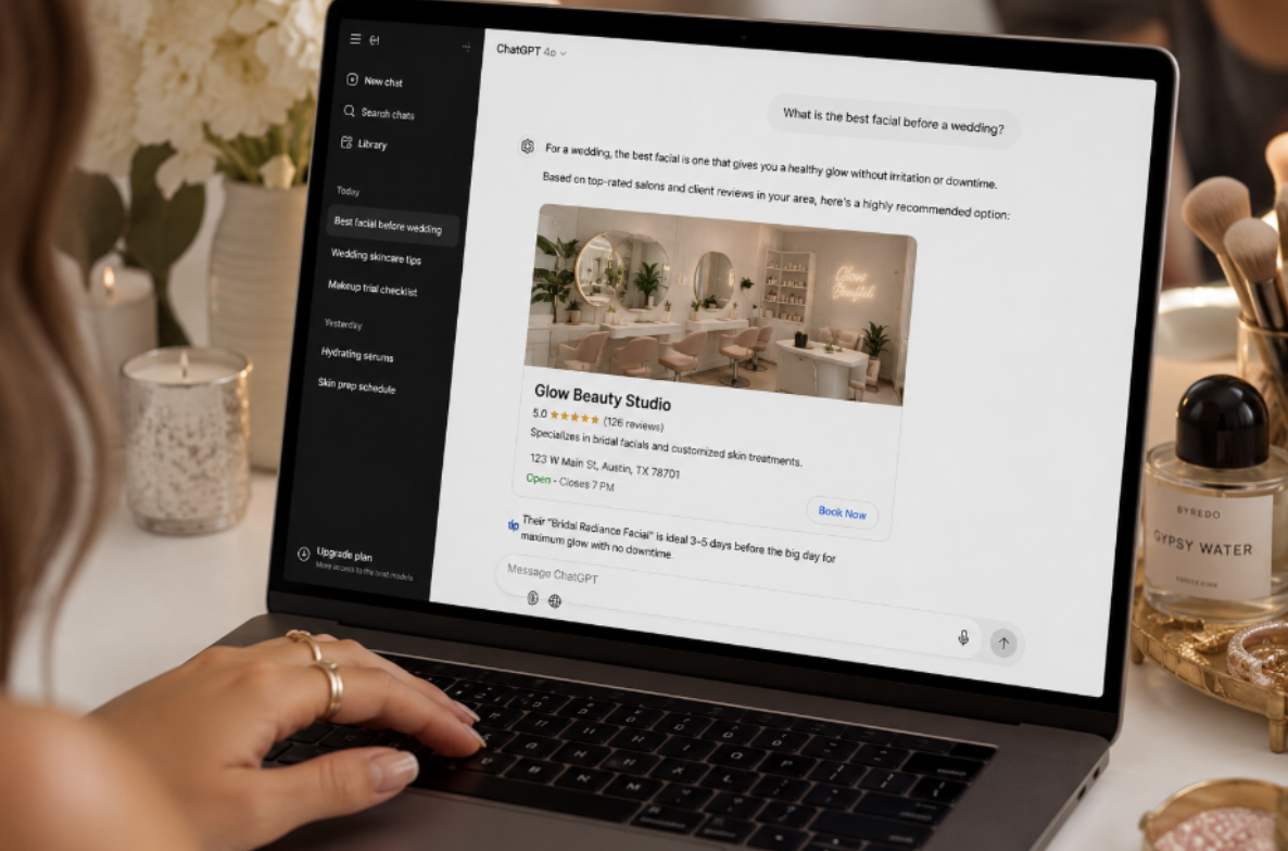 Laptop screen displays a chat-style interface discussing Glow Beauty Studio with a salon image and booking option visible on screen.