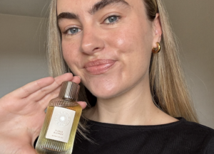 Summer Fridays Sunlit Vanilla in a journalist's hand