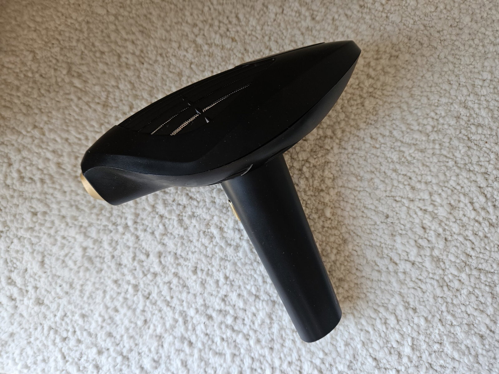 ViQure S-LD Hair Removal Device side profile showing the treatment head and ergonomic handle