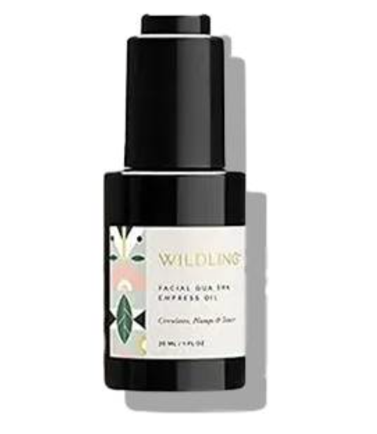 Black glass facial oil bottle with pump, labeled Wildling, on a white background with a soft shadow.