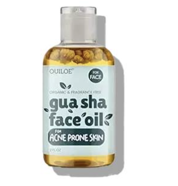 Bottle of gua sha face oil for acne-prone skin, with label reading 'gua sha face oil' and 'for acne prone skin'