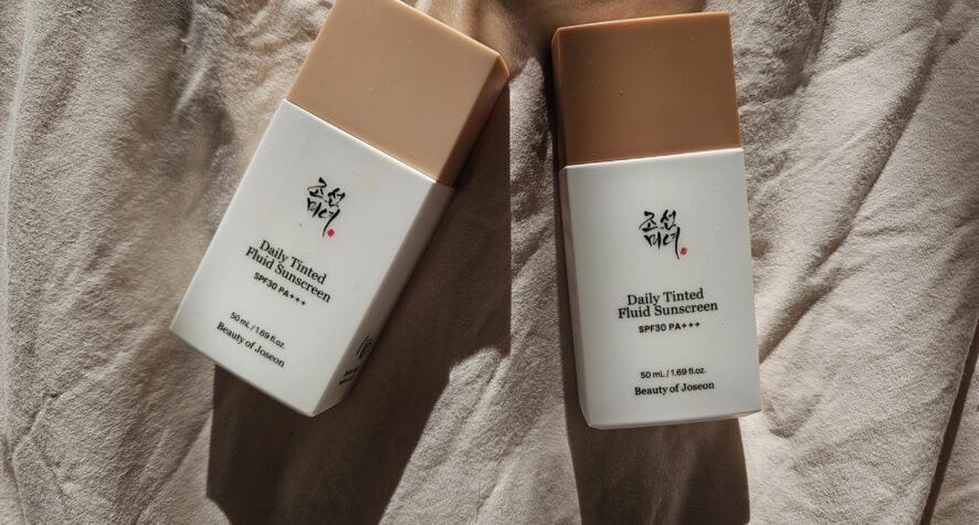Beauty of Joseon Daily Tinted Fluid Sunscreen SPF 30 bottles showing two different tint shades