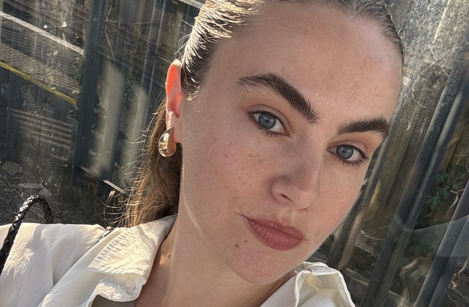 Alice Hartwell showing her naturally full, bushy brows after applying brow gel.