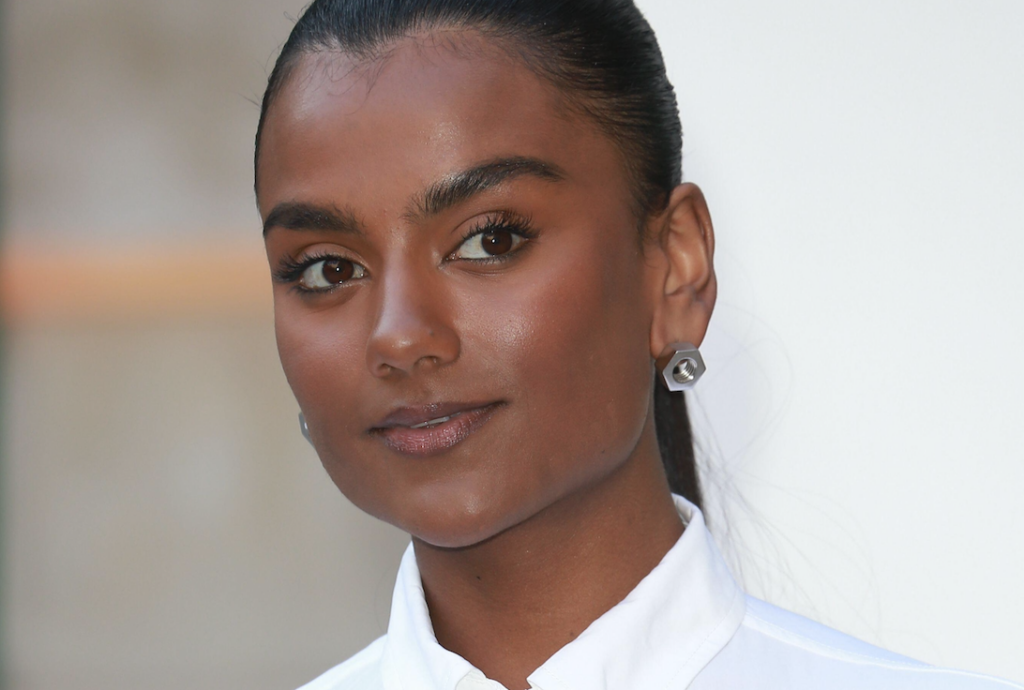 Simone Ashley with glowing skin at a red carpet event