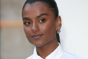 Simone Ashley with glowing skin at a red carpet event