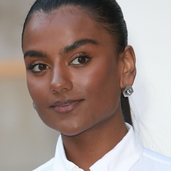 Simone Ashley with glowing skin at a red carpet event