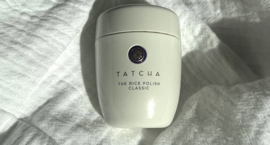 Tatcha The Rice Polish Classic photographed on white fabric for our review
