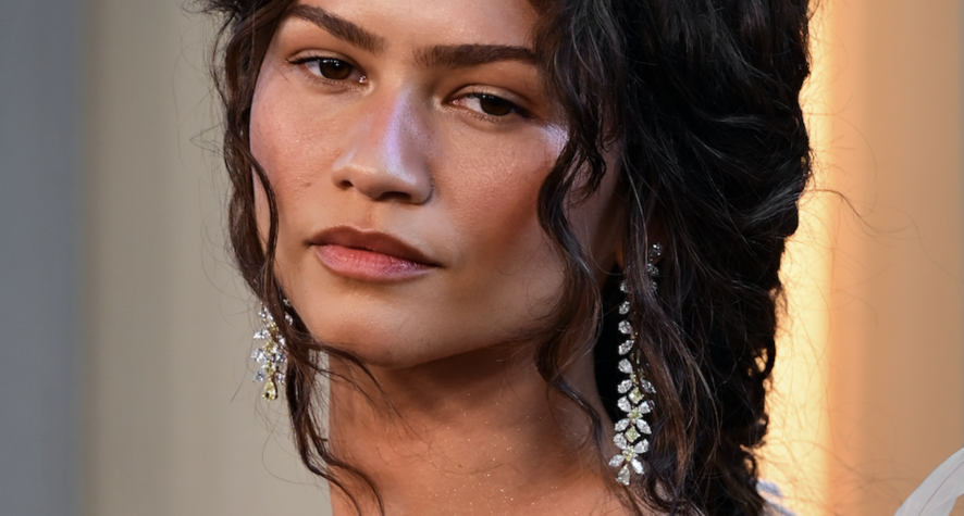 Zendaya wearing warm, softly coordinated eye, cheek and lip makeup for a pulled-together look.