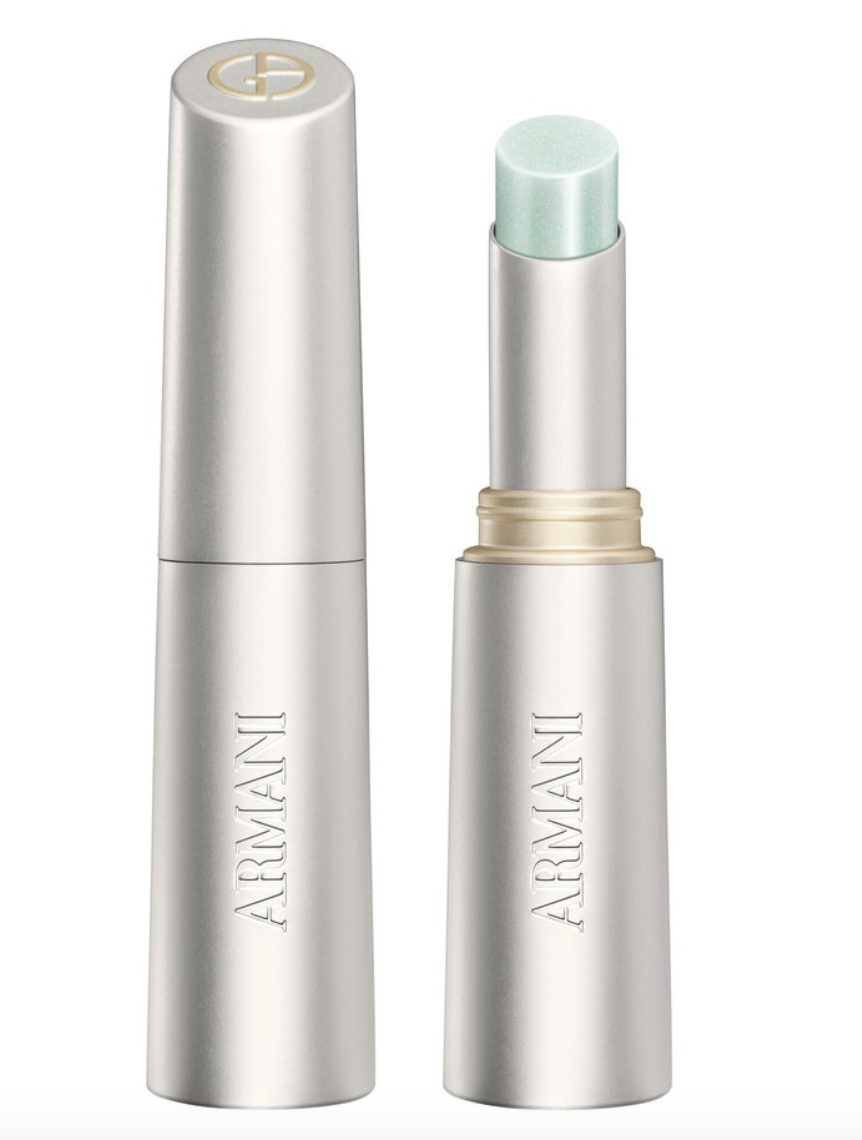Armani makeup stick in pale green with silver packaging.