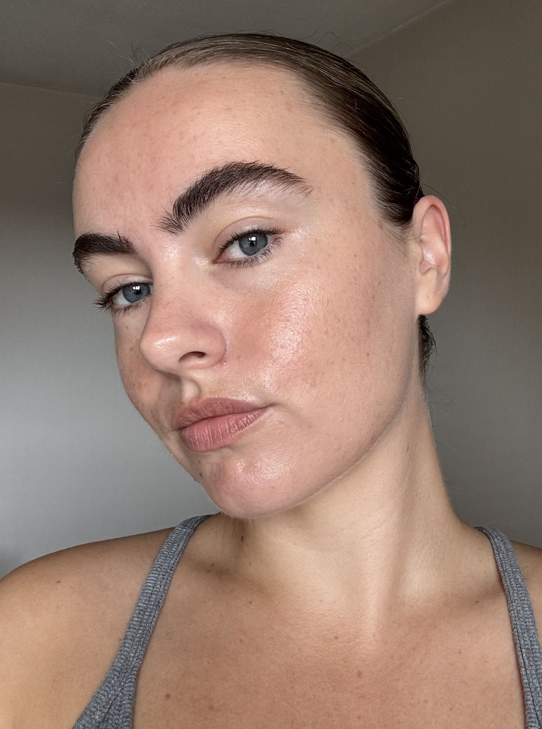 Alice wearing DCYPHER Natural Custom Foundation, showing its glowy skin-like finish
